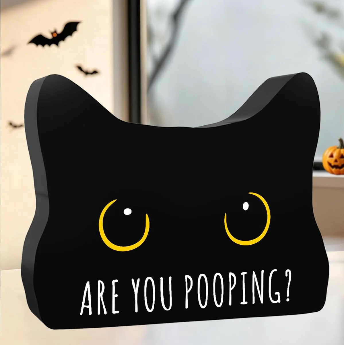 Novelty black-cat Halloween bathroom decor sign printed with the caption "Are You Pooping," pitched as a gag gift and restroom wall piece